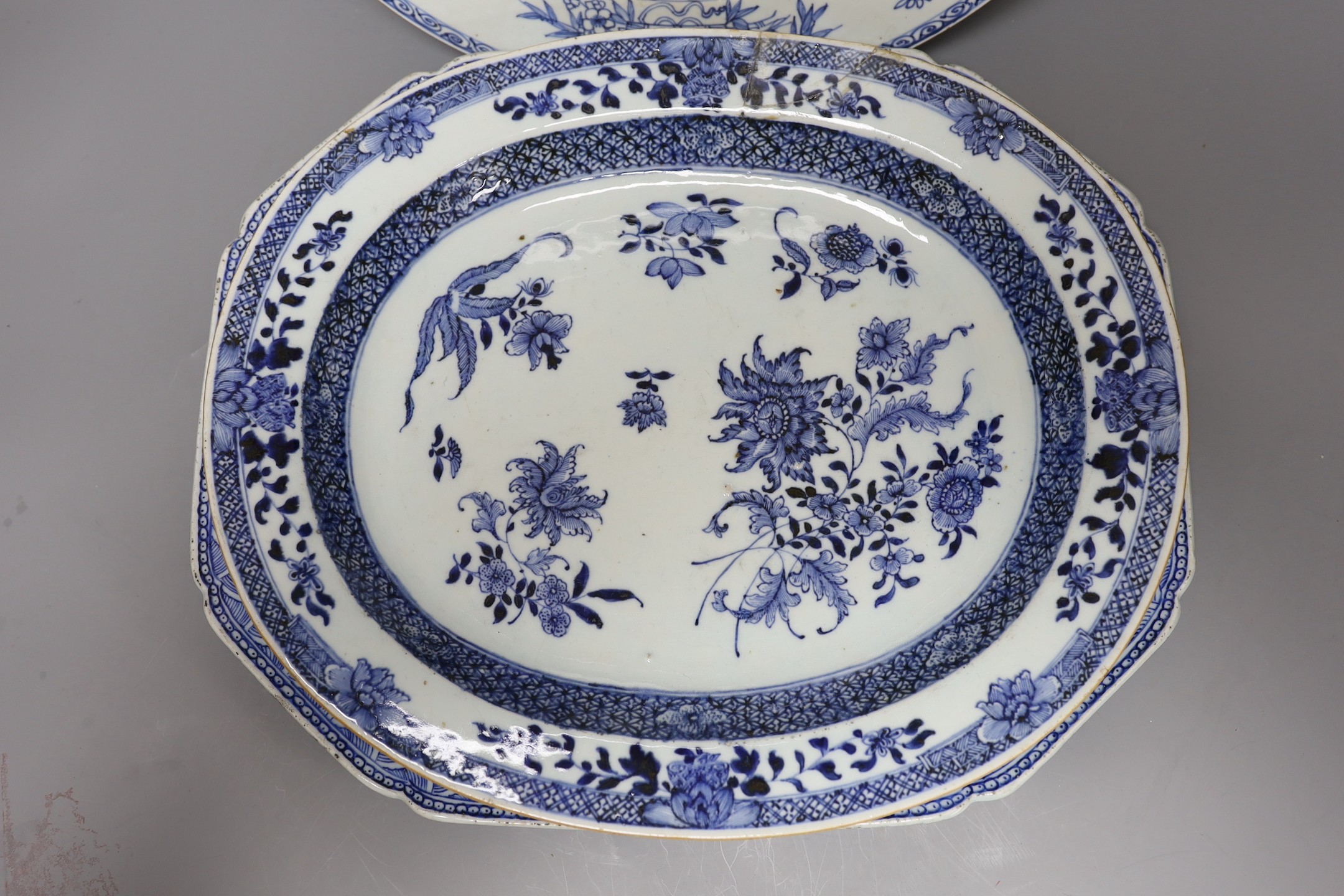 Three Chinese export blue and white dishes, 18th/19th century, largest 42cms wide